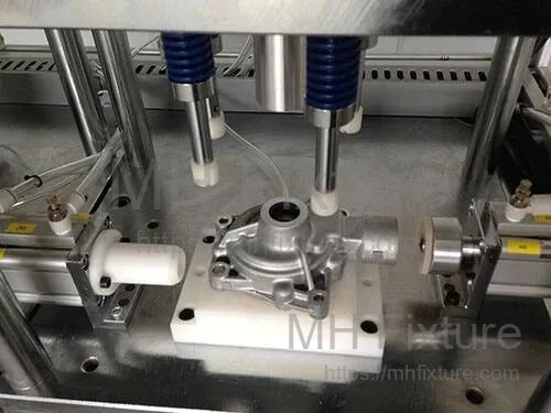 Hydraulic clamping fixture design for engine block machining showing datum management and work supports