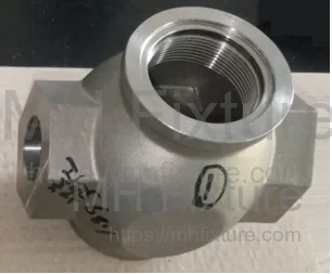 High-precision finished valve body after CNC turning and threading operations
