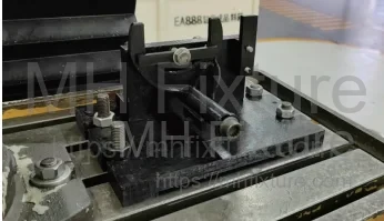 Physical shifting fork milling fixture setup with auxiliary supports